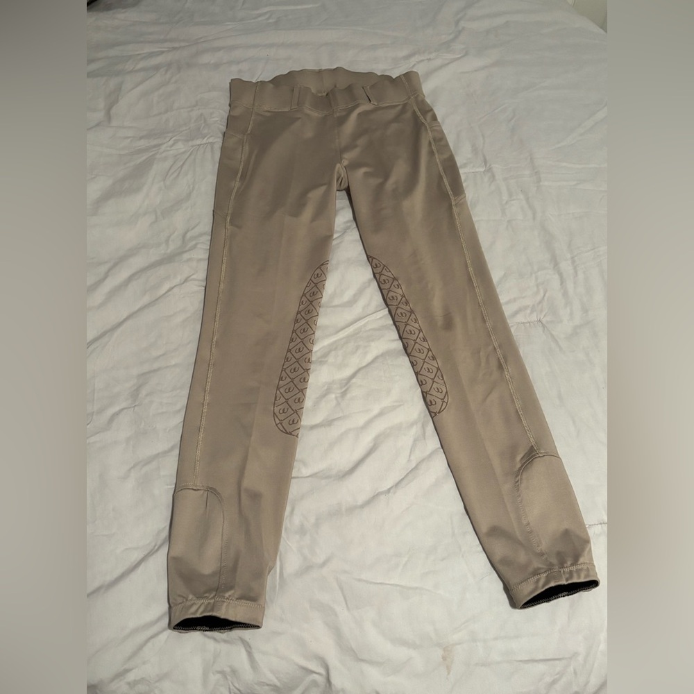 Ovation, beige riding pants in excellent condition.